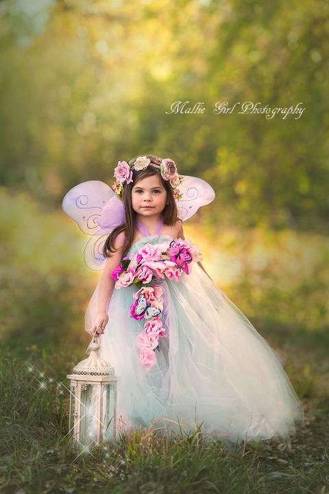 Three year old little girl dressed as a Spring Fairy