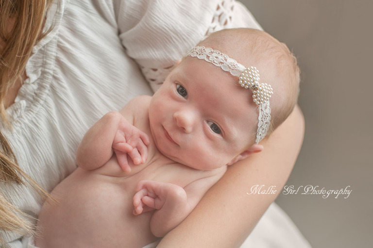 newborn in mamas arms