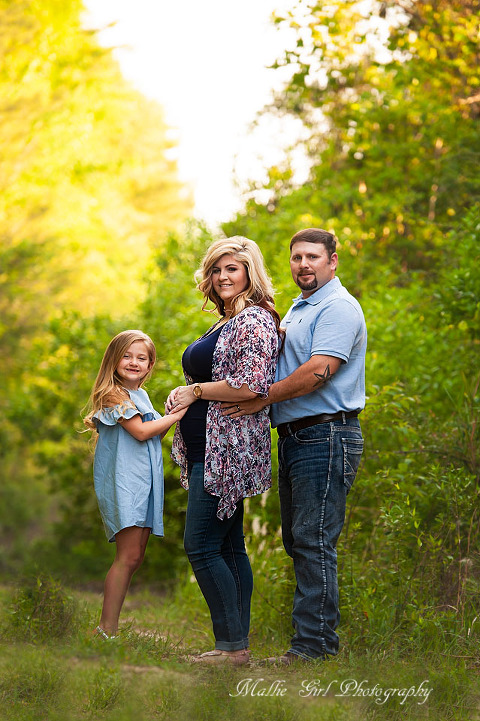 A beautiful outdoor pregnancy reveal session